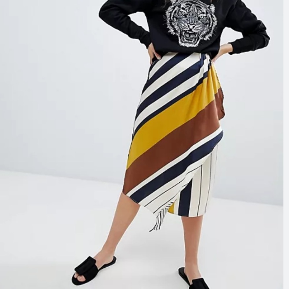 Asymmetrical skirt with front panel cascading ruffle